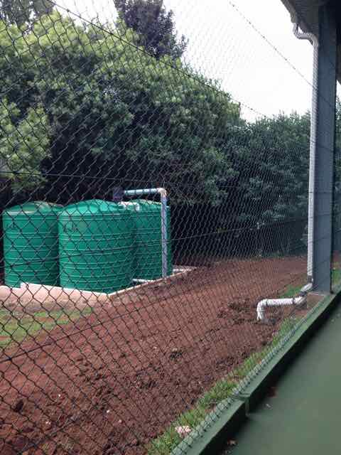 Rainwater harvesting system for indoor tennis court