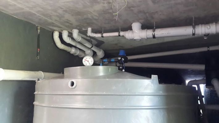 Rainwater tanks below building 